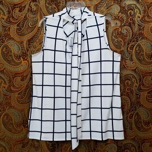 White and Black Sleeveless Blouse